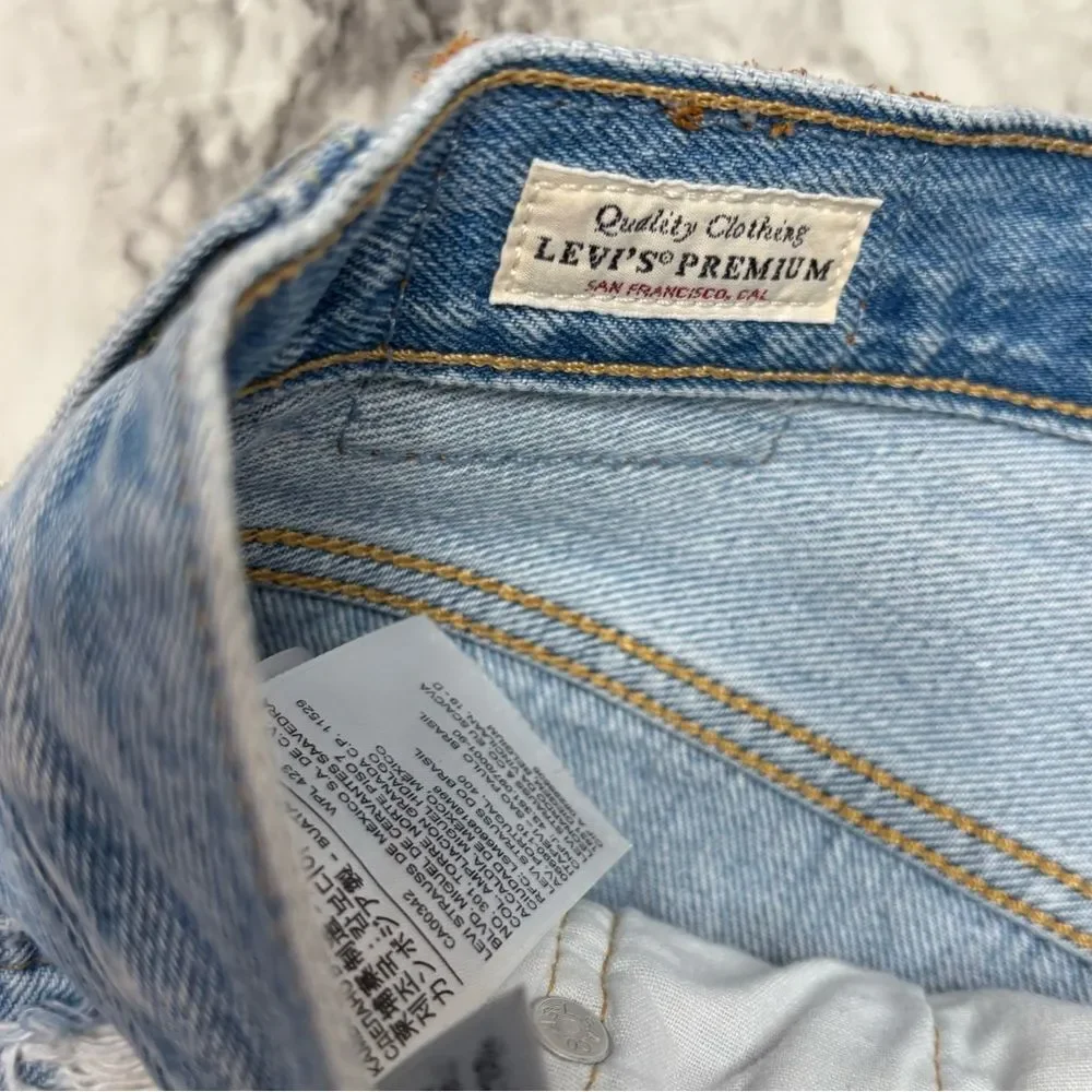 Levi’s button fly high rise vintage 90s Y2K distressed denim jean shorts size 27
